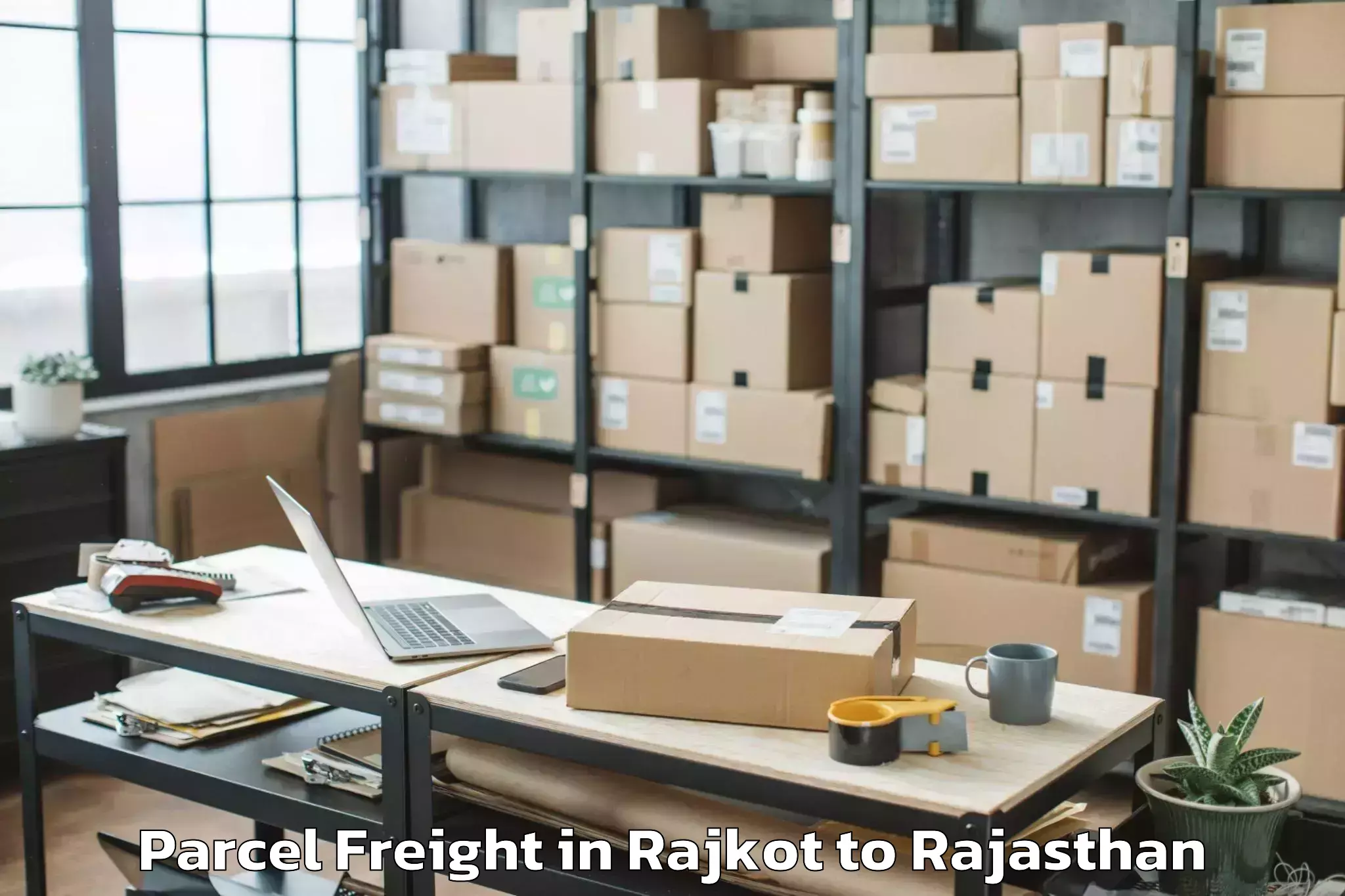 Book Rajkot to Sheoganj Parcel Freight Online